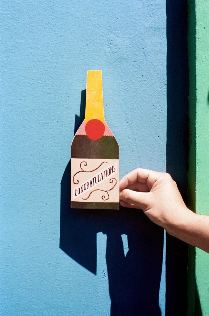 Tarjeta botella de champán