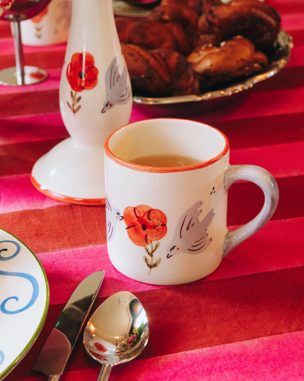 Taza amapola y pájaro