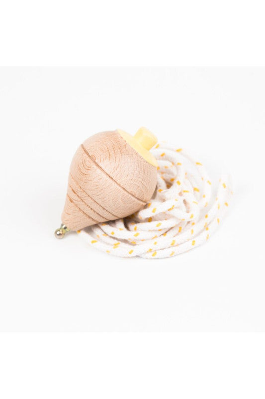 Peonza de madera amarilla